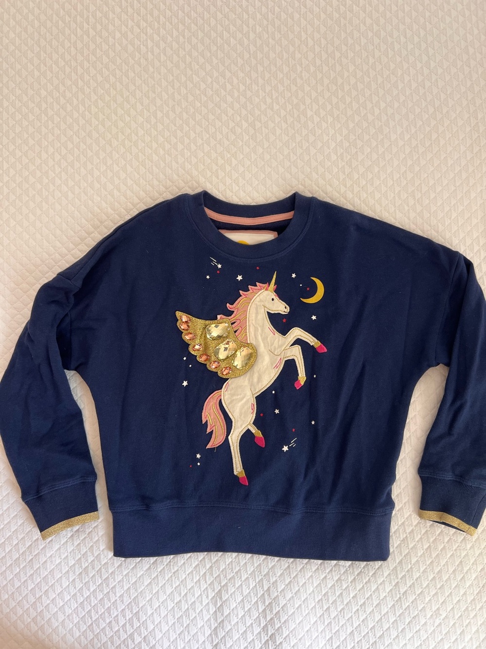 Mini Boden appliqué unicorn sweatshirt.